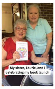 My sister, Laurie, and I celebrating my book launch